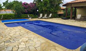 Imagem 2: Casa de condomínio térrea para venda tem 333 metros quadrados com 5 quartos