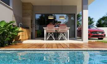 Imagem 2: Casa de condomínio para venda com 220 metros quadrados com 4 quartos em Camburi - São Seba