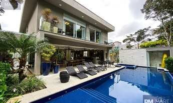 Imagem 2: Casa para venda com 450 metros quadrados com 5 quartos em Riviera - Bertioga - SP