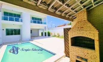 Imagem: Casa com piscina, deck com churrasqueira