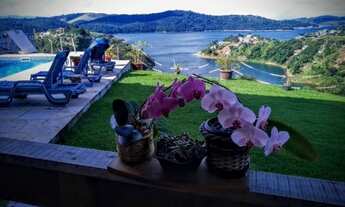 Imagem 1: Casa de condomínio para venda possui 1070 metros quadrados com 2 quartos,sendo 1 suíte- Ig