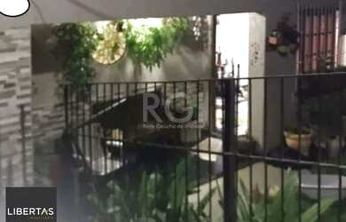 Imagem 4: Casa em Porto Alegre, no bairro Espírito Santo, com 3 dormitório(s), e 3 banheir