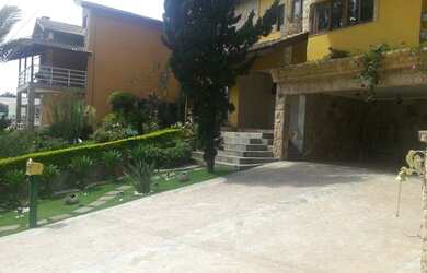 Imagem 2: Casa à venda possui 300 m^2 de terreno no Cond. Aruã - Mogi das Cruzes - SP