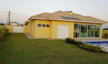 Imagem 6: Casa de condomínio térrea para venda possui 206 metros quadrados com 3 quartos