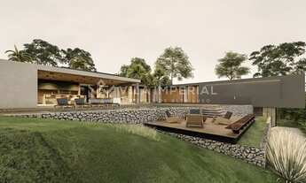 Imagem: Refúgio com pé no golfe e vista para o