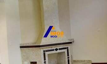 Imagem 7: Casa com lareira e quadra poli esportiva