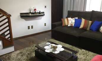 Imagem 2: Amplo sobrado com sacada e 4 vagas de garagem em Jardim do Estádio - Santo André - SP