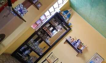 Imagem 6: Casa na rua de frente a feira