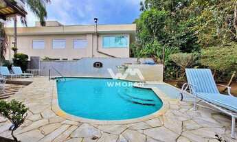 Imagem 7: Casa com 5 dormitórios (4 suítes) à venda, 307 m² por R$ 3.950.000 - Riviera - Módulo 28