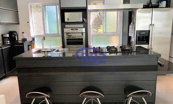 Imagem 7: More em uma excelente casa de três suites no melhor condominio da região oceânica