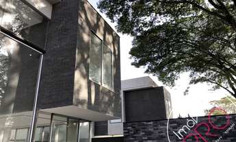 Imagem 2: Casa em condomínio com 4 suítes e 5 vagas