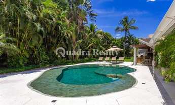 Imagem 2: Casa com espaço gourmet ao lado da quadra de tênis