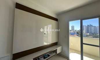 Imagem 6: Apartamento de 2 quartos, sendo uma suite, elevador, garagem coberta e sacada com churrasq