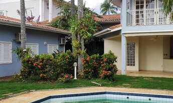 Imagem 2: Casa de condomínio térrea para venda possui 455 metros quadrados com 5 quartos