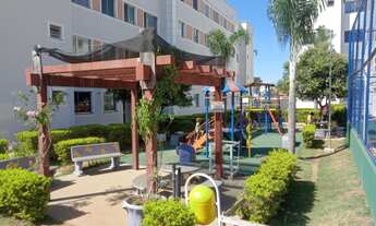 Imagem 2: Apartamento térreo com quintal e armários na cozinha