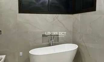 Imagem 2: Casa alto padrão com três suítes, escritório com lavabo e área gourmet completa