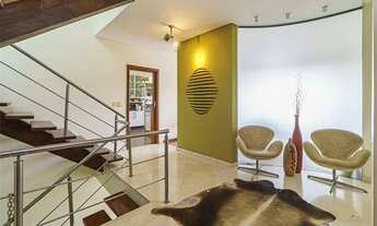 Imagem 7: Descubra a casa dos seus sonhos neste oásis de conforto e luxo, localizado no perímetro do