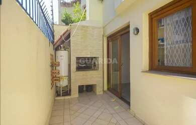 Imagem 7: Casa em condomínio mobiliada com 4 dormitórios no bairro Tristeza!