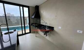 Imagem 5: Sobrado moderno com piscina e churrasqueira no condomínio Flora Rica - Peruíbe - SP