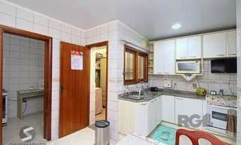 Imagem 4: Casa em Porto Alegre, no bairro Tristeza, com 3 dormitório(s), e 3 banheiros, à