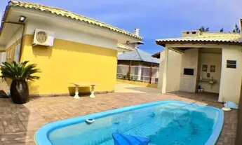 Imagem: Casa uma quadra do mar com 3 dormitórios