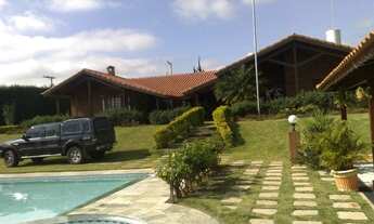 Imagem 2: Chácara para aluguel e venda possui 10700 metros quadrados e 8 quartos em Condomínio Porta