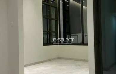 Imagem 6: Casa alto padrão com três suítes, escritório com lavabo e área gourmet completa