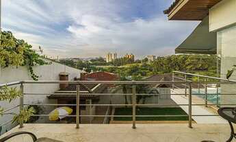 Imagem 4: Descubra a casa dos seus sonhos neste oásis de conforto e luxo, localizado no perímetro do