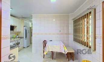 Imagem 5: Casa em Porto Alegre, no bairro Tristeza, com 3 dormitório(s), e 3 banheiros, à