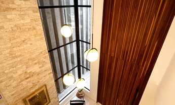 Imagem 2: Casa de condomínio para venda possui 340 metros quadrados com 5 quartos