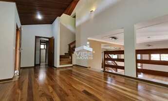 Imagem 7: Casa à venda no San Conrado, rua com pouco movimento