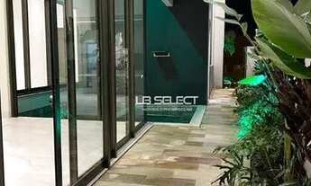 Imagem 5: Casa alto padrão com três suítes, escritório com lavabo e área gourmet completa