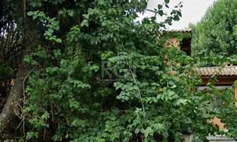 Imagem 3: Casa com quatro (4) dormitórios, duas (2) vagas de garagem, no bairro Passo da Areia em Po