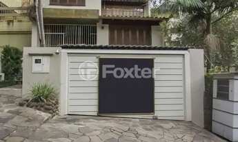 Imagem 2: Sobrado para venda tem 280 metros quadrados com 3 quartos em Mont Serrat - Porto Alegre