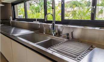 Imagem 3: Casa de condomínio térrea para venda possui 1721 metros quadrados com 4 quartos