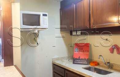 Imagem 6: Flat na região central de SP com 32m² contendo 1 dormitório e 1 vaga disponível para locaç