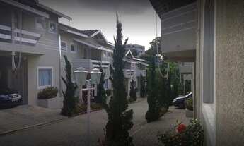 Imagem 2: Casa de condomínio sobrado para aluguel possui 107 metros quadrados com 3 quartos