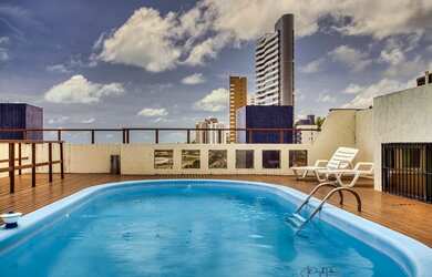 Imagem 4: Apartamento com varanda ampla e vista para o mar