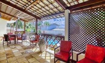 Imagem 4: Casa rústica com piscina e vista para a lagoa