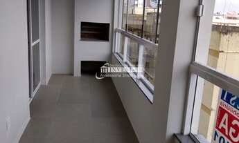 Imagem 7: Apartamento com 2 dormitório, suíte, sacada com churrasqueira, garagem e elevador