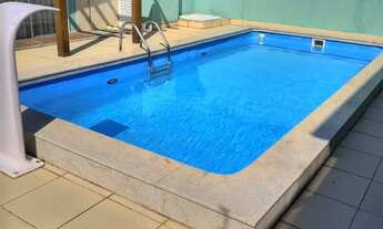 Imagem 2: Casa com Ampla Área de Convivência e Piscina