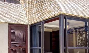 Imagem 3: Apartamento com varanda ampla e vista para o mar