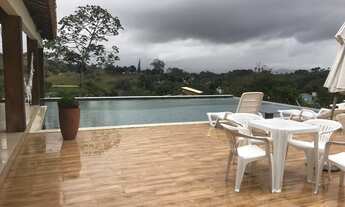 Imagem 5: Casa de condomínio para venda possui 320 metros quadrados com 5 quartos