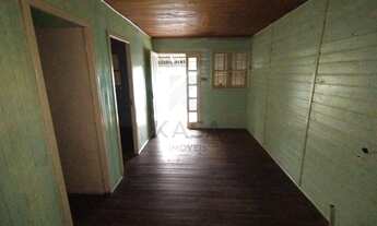 Imagem 6: Casa de madeira com 02 dormitórios, sala de estar, cozinha, banheiro e entrada p/carro...