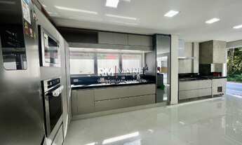 Imagem 7: Casa para venda possui 450 metros quadrados com 4 quartos em Riviera - Bertioga - SP