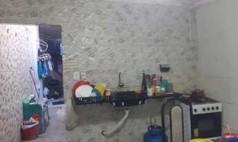 Imagem 2: Vendo uma casa com um prédio no fundo