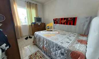 Imagem 5: Casa com rua asfaltada no litoral