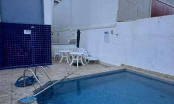 Imagem 2: Quarto e sala na Pituba com piscina