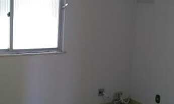 Imagem 7: 4 quartos (sendo 1 de serviço), sala, cozinha com armários 1 vaga na garagem