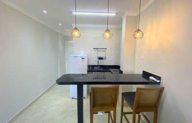 Imagem 2: Kit net na praia de pitangueiras, com vaga de garagem, acomodação para 3 pessoas